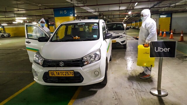 Cab getting sanitised at the Sanitization hub in Delhi